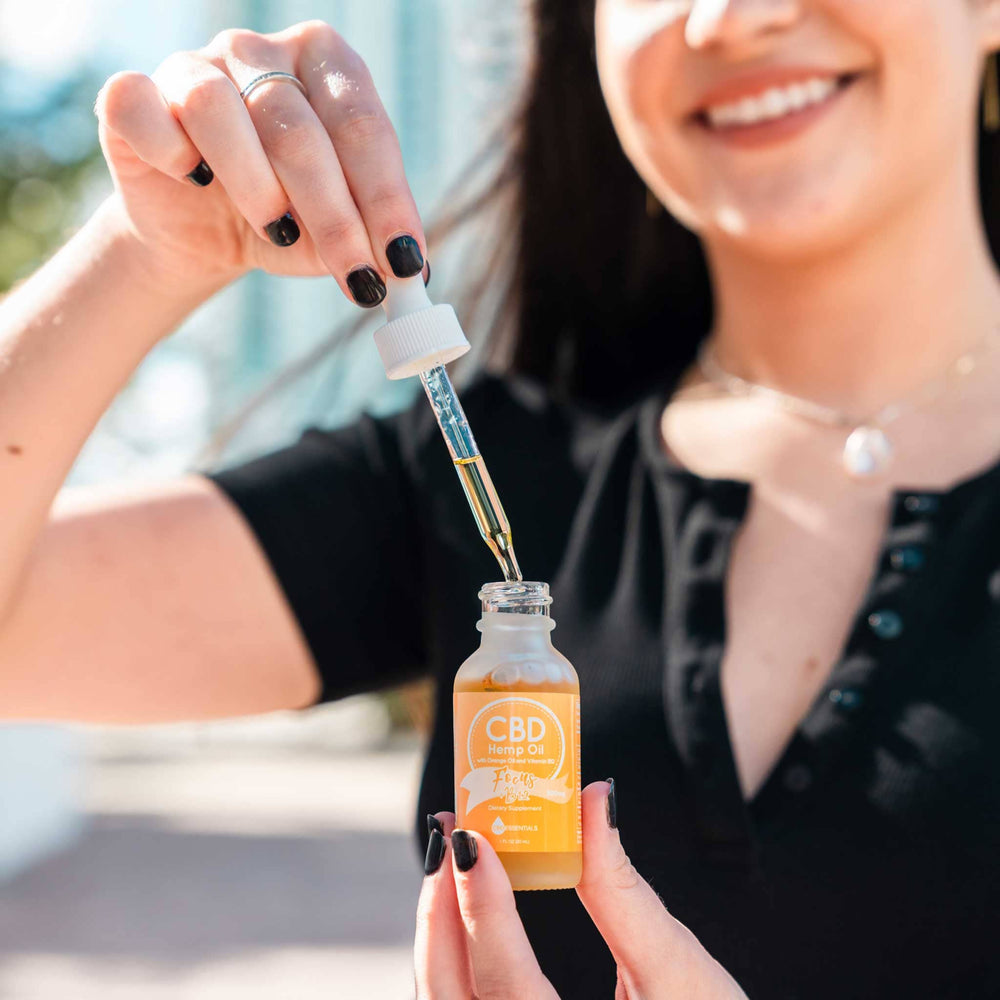 Happy woman with Focus Tincture