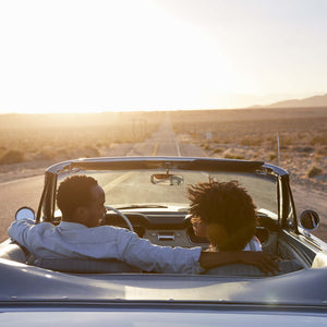 Rear view of couple on road trip